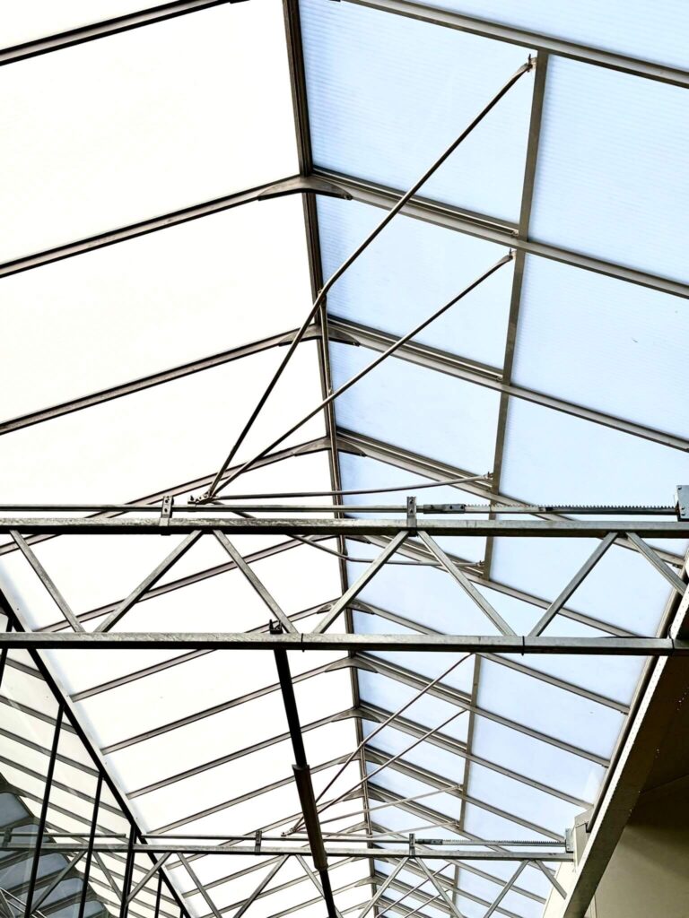 “Gable, roof, and gutter systems installed at greenhouse project in Delfgauw, Netherlands.”